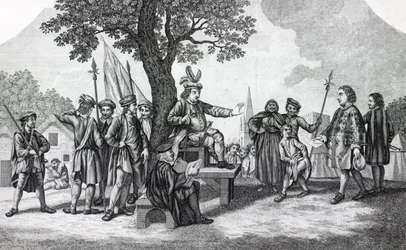 Robert Kett sitzt unter dem 